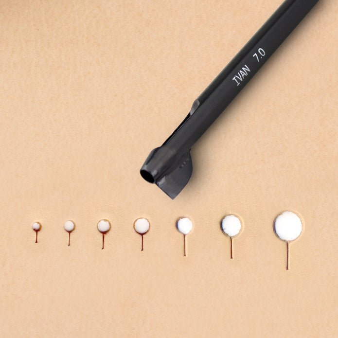 Perforatrice pour trous de bouton