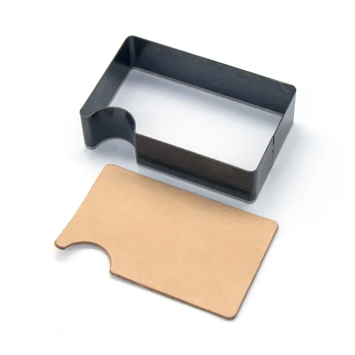 Stansing for kortholder med avrunding